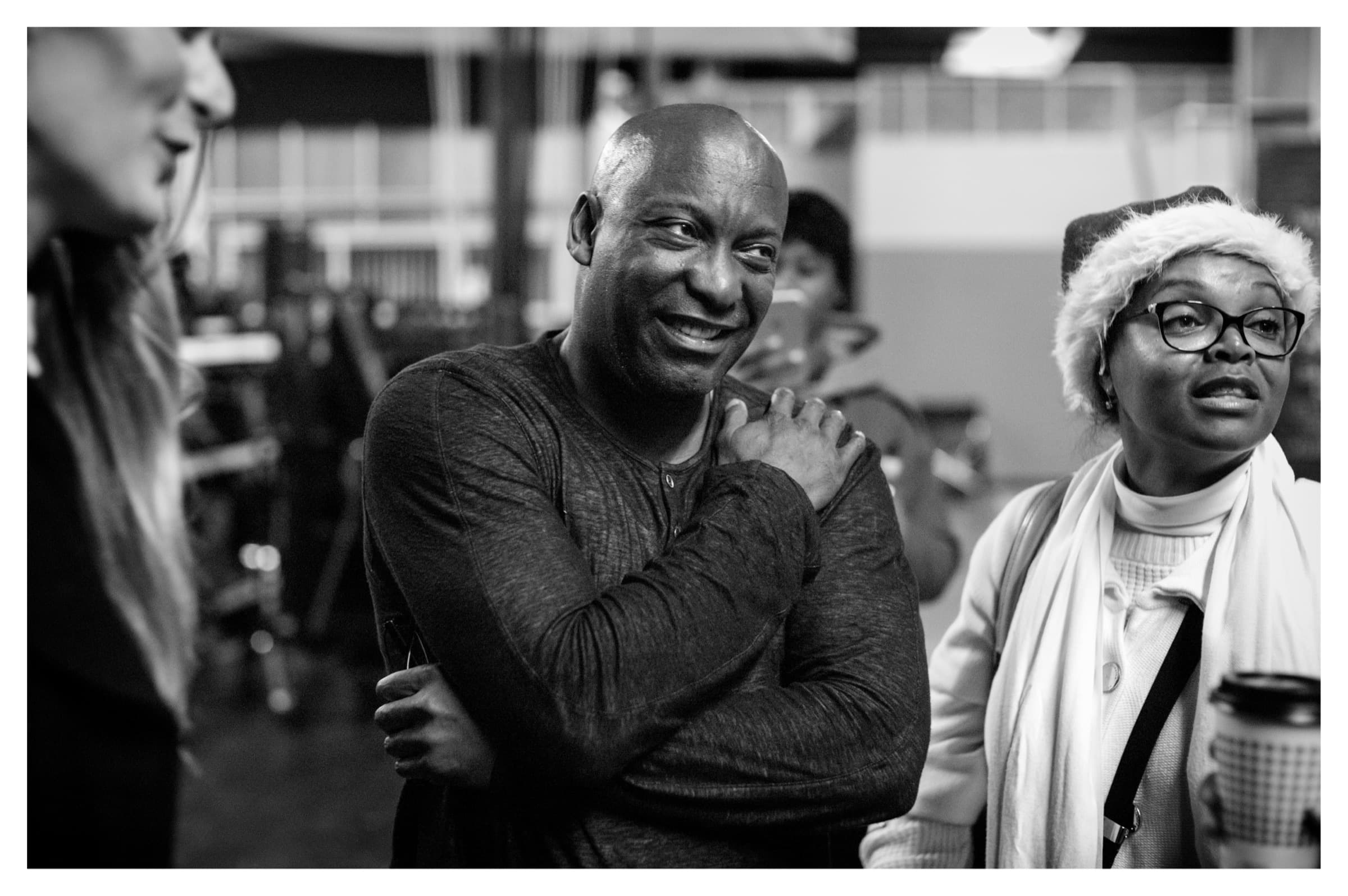 Founder Dion Fearon and John Singleton on set between setups